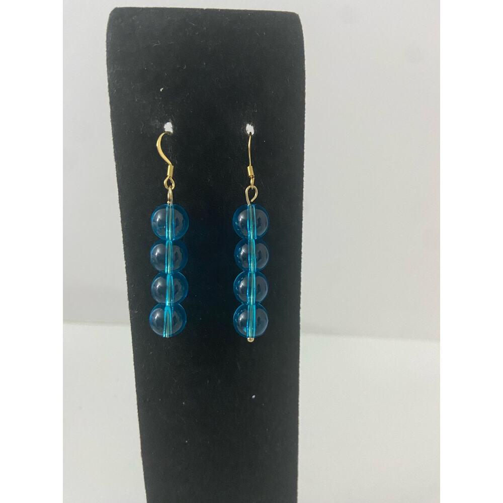Bright blue glass bead earrings gold tone